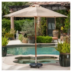 Hayward 88lbs Round Umbrella Base With Wheels - Black - Christopher Knight Home -Outdoor Furniture Store GUEST 5e67ae7b 41fd 4982 95b2 dcfcc507c729